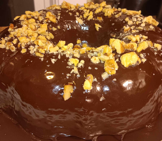 YELLOW BUDNT CAKE W/ CHOCOLATE GLAZE FROSTING & WALNUTS